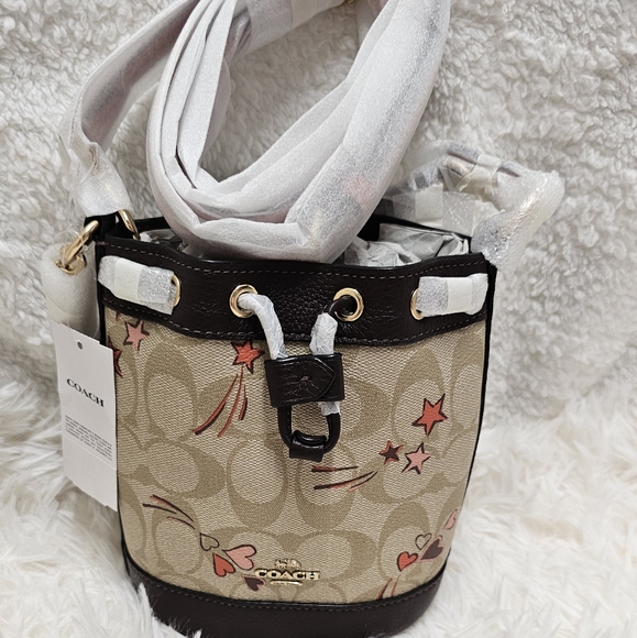 COACH Bags Mini Dempsey Bucket Bag in Signature Canvas with Heart And Star Print - Picture 1 of 11